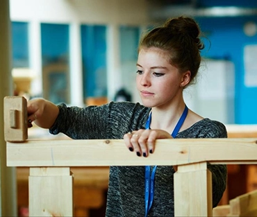 Ffion Hobbs working on bench joinery